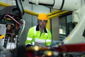big welding robot is being inspected controlled by robotics engineer 159755 4008 1