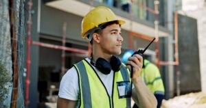 contractor engineering man with radio communication building development employees coworkers management renovation construction site safety with helmet talk architecture 590464 522816 1