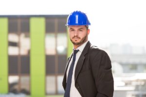 portrait business man with blue helmet construction 600776 16369