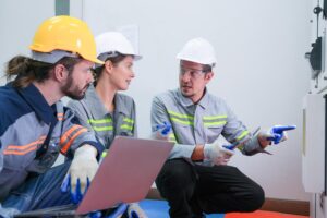 professional engineer workers training testing machine industry factory concept people operation industrial industry robot programming software automated manufacturing technology 28976 2511