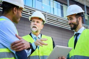 several concentrates engineers talk carefree outdoor meeting three smiling multiracial architects 325573 2444
