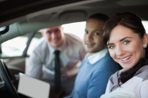 smiling couple new car 13339 264778 1