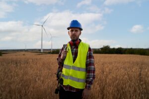 technical engineer looking camera standing wind farm professional technician outdoors 325573 960