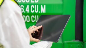 woman inspector manager checking cargo container cargo customterminal port woman use tablet checking cargo concept import export transportation logistic insurance service 33850 2667